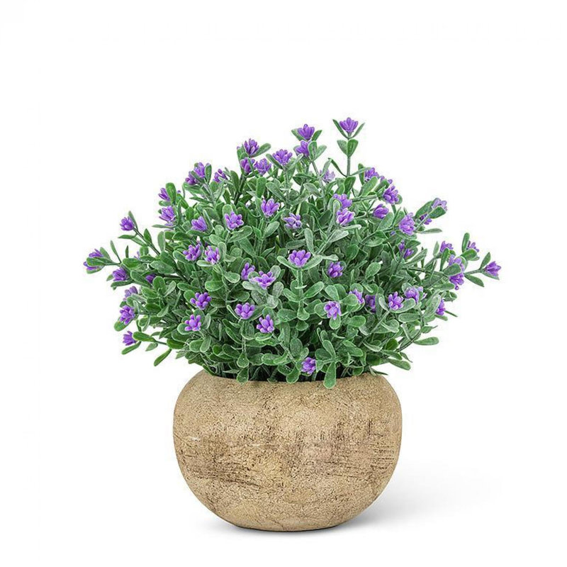 Fleur mauve dans un pot de fleurs artificielles