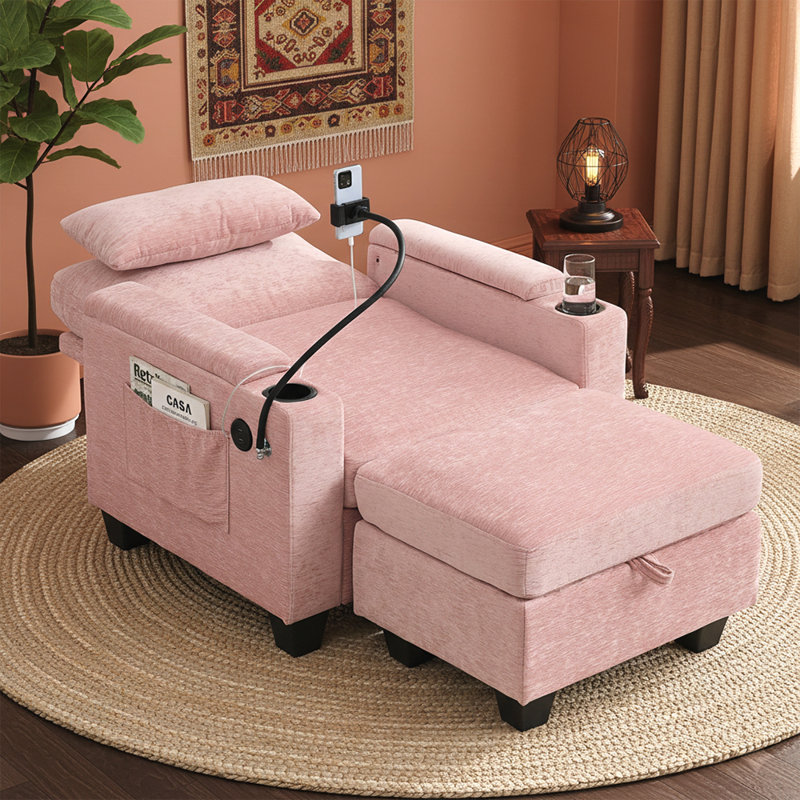 Single sofa recliner with manually adjustable backrest, USB charging port on the armrest side, and a matching storage ottoman