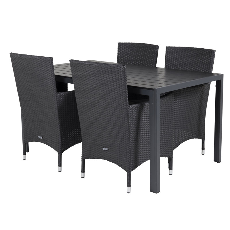 Hiran 4 - Person Patio Dining Set with Rectangular Table , Cushions Included, Black