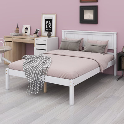 Platform Bedstead Featuring Attached Headboard and Sturdy Slat Foundation