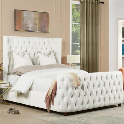 Currier Upholstered Wingback Bed