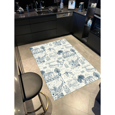 Sassan Performance Washable Animal Print Indoor / Outdoor Rug