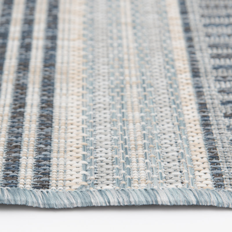 Dakota Fields Huriye Light Blue 6 ft. 6 in. x 9 ft. 6 in. Stripe Indoor/Outdoor Polypropylene Area Rug