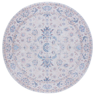 Cvjatko Oriental Machine Woven Polyester Area Rug in Ivory/Blue