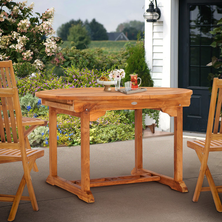Clarisse Extendable Round Teak Outdoor Dining Table