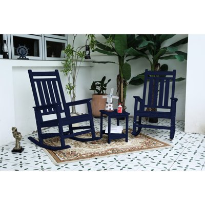 Navy Blue All Weather Rocking Chair With Table. Ergonomic Design For Optimal Comfort. Widened And Contoured Seat. 32.5"D X 25.9"W 41.7"H. Can Withstand 380 Pounds. 30-Min Partial Installation. Made