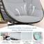 Fauteuil pivotant 360 ° en osier avec coussins