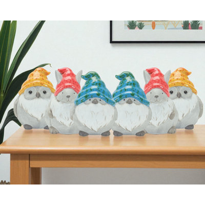 Ensemble de six gnomes de la faune en terre cuite grise