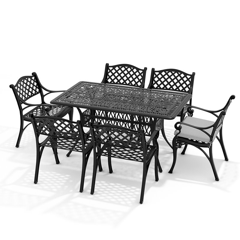 Claudi 6 - Person Patio Dining Set Umbrella Hole Included Rectangular Table with Cushions Included, Black
