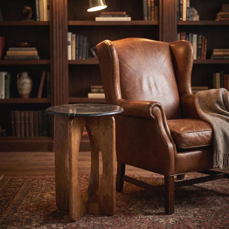 Table d'appoint ronde à découpes en bois de marbre noir