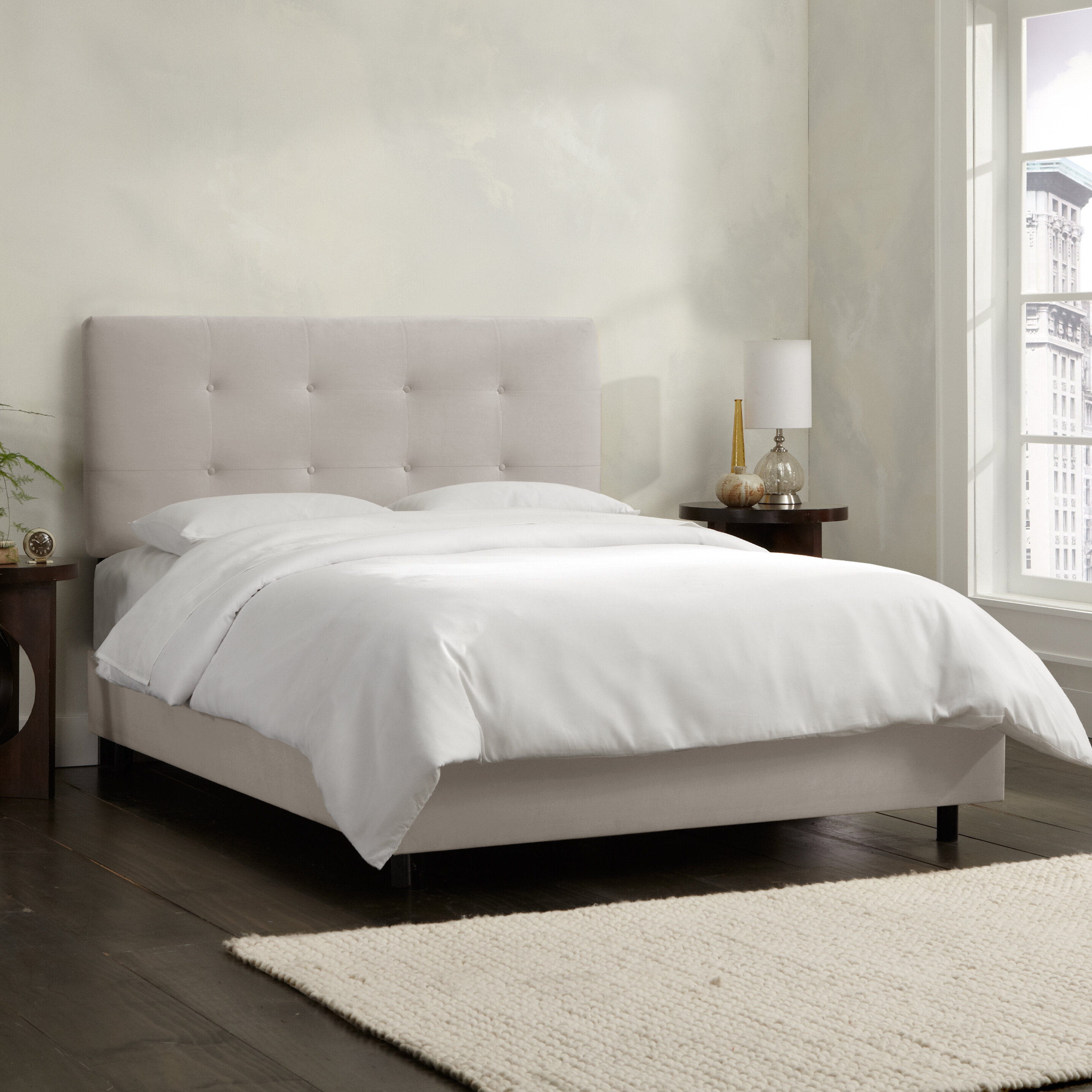 Light grey tufted deals bed