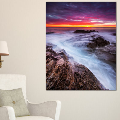Bord de mer orageux avec reproduction de photo sur toile tendue avec ciel coloré