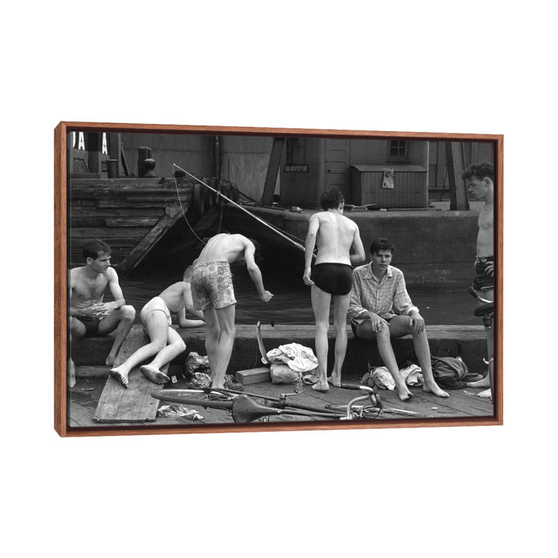 Boys Fishing At Ganservoort Pier (1948) by Ruth Orkin - Print on Canvas, 66.04 cm H x 45.72 cm W, Classic Brown Wood Framed