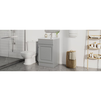 [Vidéo] Meuble-lavabo de 20 po avec lavabo, meuble-lavabo avec tablette de porte et tablette réglable, gris