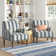 Arching Armchair With Solid Wood Turned Legs and Nailhead Trim