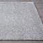 Tapis uni gris clair en polypropylène tissé à la machine-86184012