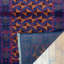 Tapis orange / bleu marine Hilario
