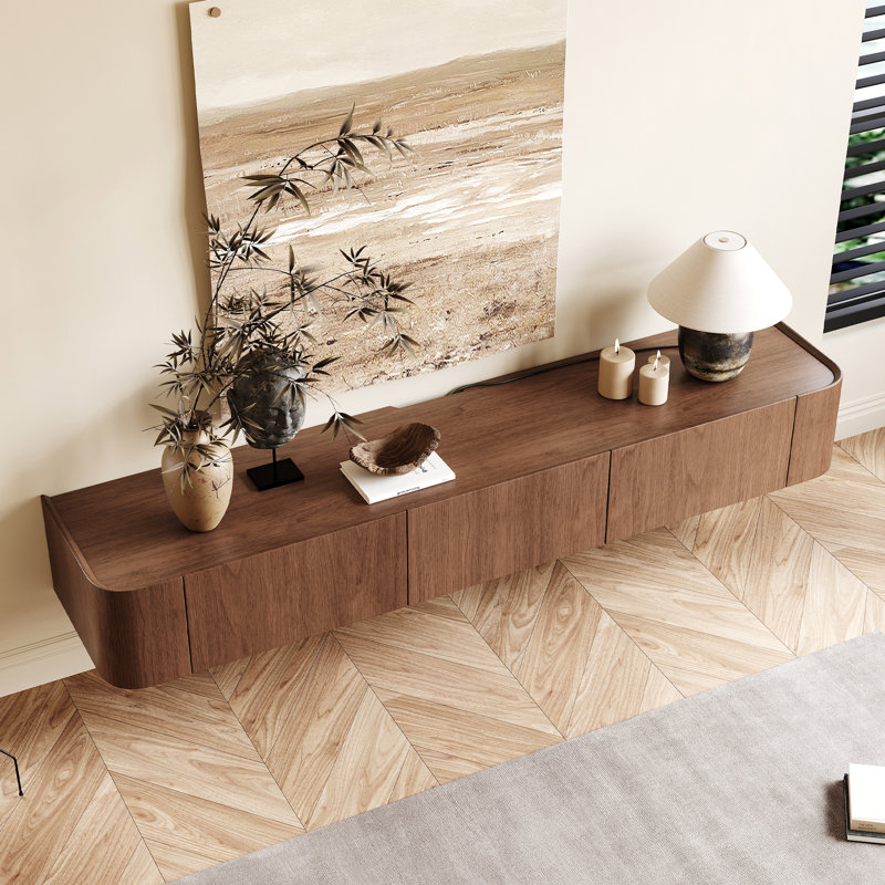 Wall mounted TV cabinet made of brown wood with three drawers