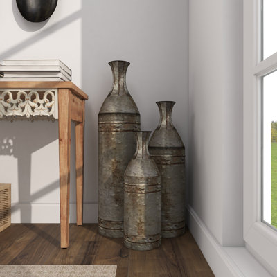 Ensemble de grands vases décoratifs en métal Haroun