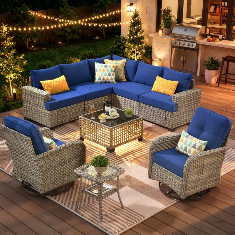 Ensemble de conversation modulaire en rotin avec coussins Wahkon pour 7 personnes avec table basse éclairée et chaises pivotantes