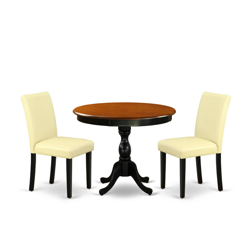 L'ensemble de table de cuisine 3 pièces comprend une table de salle à manger ronde avec piédestal et 2 chaises de salle à manger Parson