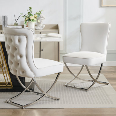 Chaise de salle à manger capitonnée en velours avec pieds en X argentés