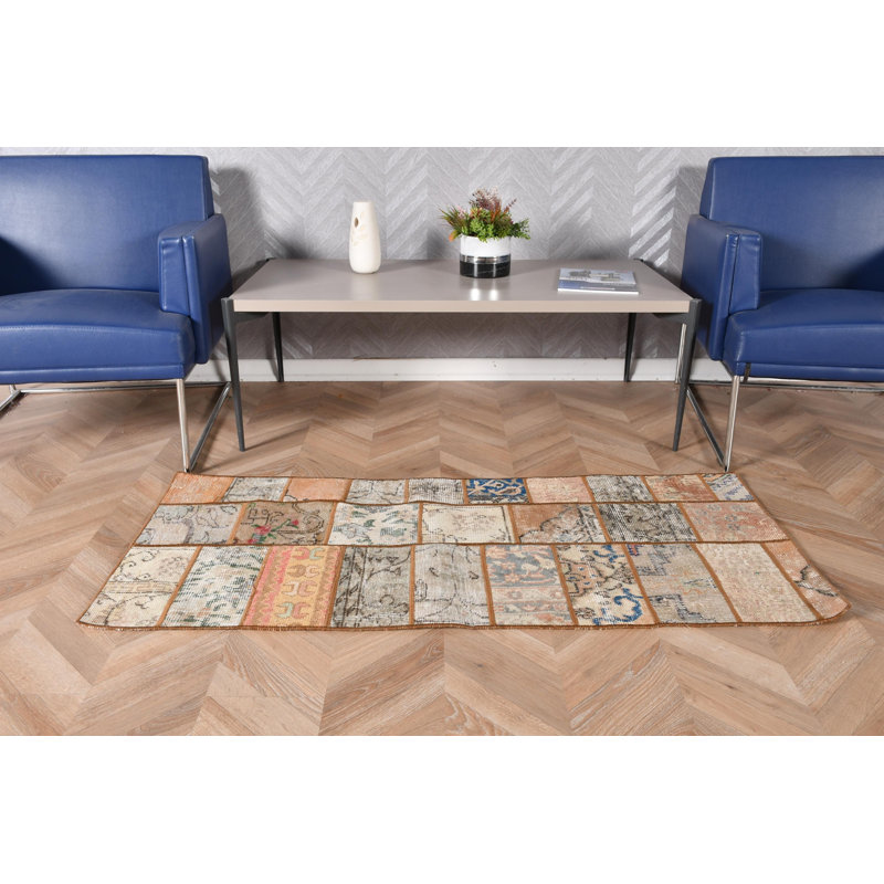 Handmade Patchwork Turkish Rug In Blue and Beige Tones Serving As A Unique Door Mat With Colorful Vintage Patterns