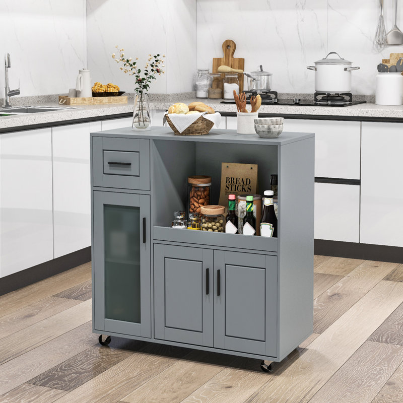 Îlot de cuisine à roulettes avec tiroir et armoire de porte en verre