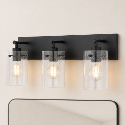 Éclairage pour salle de bain 3 lumières Northfield, 21 po de largeur, verre transparent ensemencé, contre-plaque en acier, à intensité variable, compatible DEL, fixation réversible