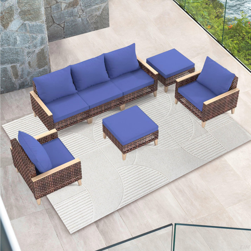 Ensemble de meubles d'extérieur en osier avec coussins amovibles et conception ergonomique pour divers espaces