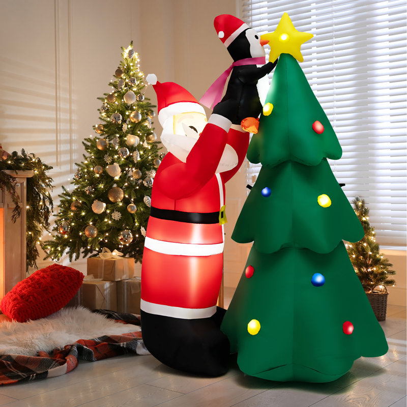 Arbre de Noël et père Noël gonflable