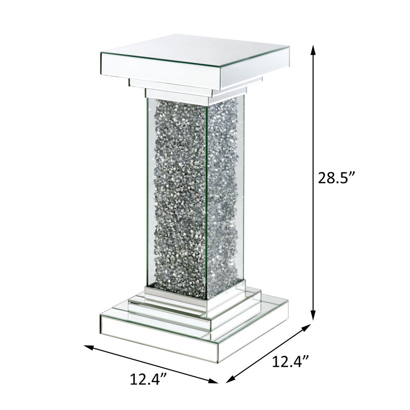 Piédestal, miroir et faux diamants