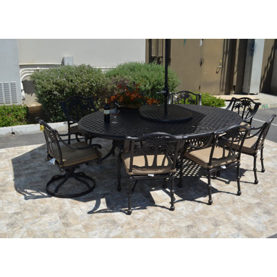Maccharles 8 - Person Patio Dining Set with Oval Table , Cushions Included