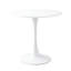 Table ronde blanche avec piètement en acier massif pour un usage quotidien dans un salon moderne et stable