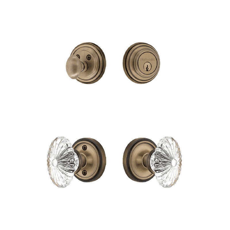 Nostalgic Warehouse Classic Rosette Entry Set with Oval Fluted Crystal, 2.375, Antique Brass
