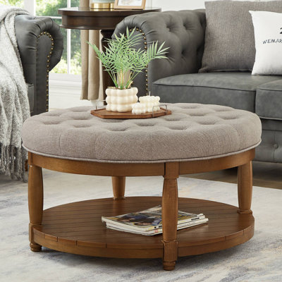 Grande table basse ronde avec repose-pieds rembourré en lin et grand repose-pieds avec rangement en bois