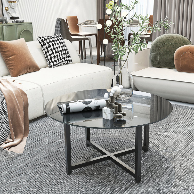 Table basse ronde avec plateau en verre
