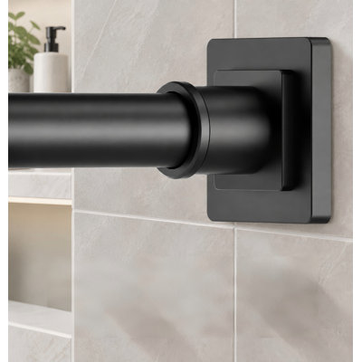Une tringle à rideau de douche noire avec ressort de tension, réglable de 31 à 79 pouces ; elle s'installe sans perçage et est dotée d'une conception antirouille.