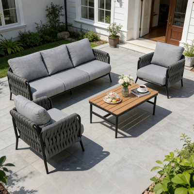 Ensemble de mobilier d'extérieur 4 pièces, ensemble de conversation en corde tissée à la main avec coussins en oléfine et table basse WPC, capacité de 330 lb pour la cour, le balcon et le jardin