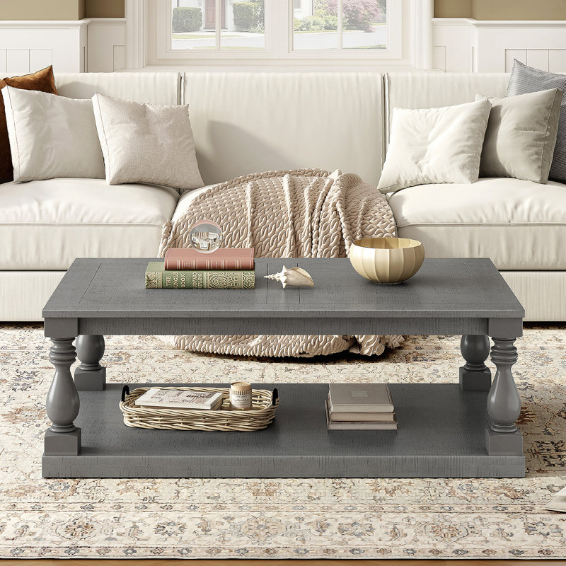 Table basse U_STYLE avec pieds en colonne de style artistique et placage de pin luxueux pour un charme intemporel, convenant au salon et à la salle d'étude