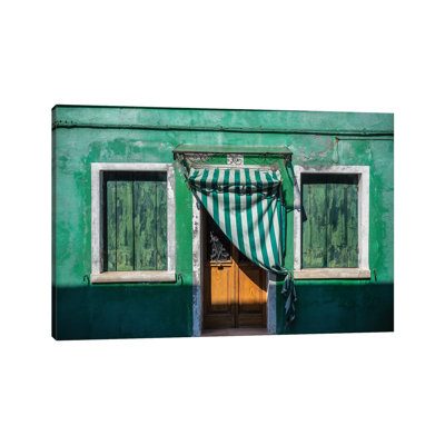 Italy, Burano. Weathered House Exterior. by Jaynes Gallery - Wrapped Canvas Print