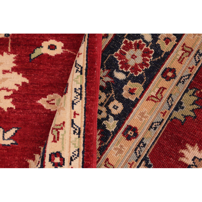 Tapis rouge / beige en laine Baccio