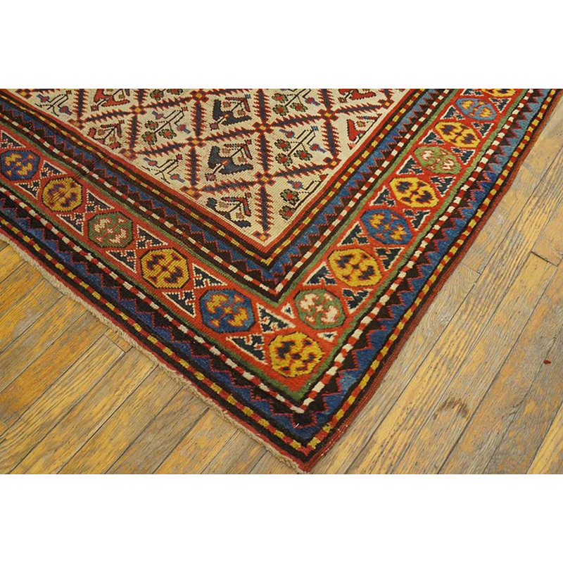 Tapis ivoire antique de style Kazak