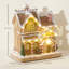 Light and Music Gingerbread House Christmas Decoration, Indoor Tabletop Home Mantel Holiday Display, Gingerbread House with Built in Lights and Christmas Music