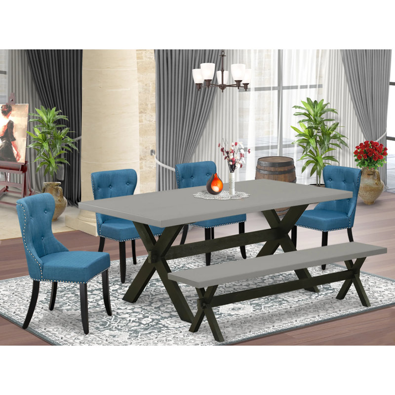 L'ensemble de table de salle à manger 6 pièces comprend une table rectangulaire en bois avec pieds en X et 4 chaises rembourrées en tissu de lin bleu avec un banc, noir brossé