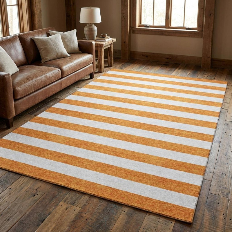 Tapis lavable rayé orange et ivoire 8 pi x 10 pi avec protection UV