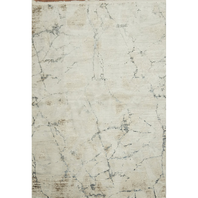 Élégant tapis ivoire et gris avec motif marbré 5 x 8
