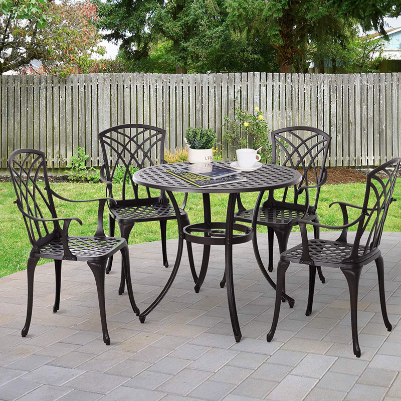 Tesha 4 - Person Patio Dining Set with Round Table