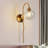 Elisabette Gold Iron Wallchiere with Smoky Glass