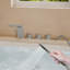 Robinet de baignoire romaine à 3 poignées à fixation sur le comptoir avec bec cascade et douche à main-79598562